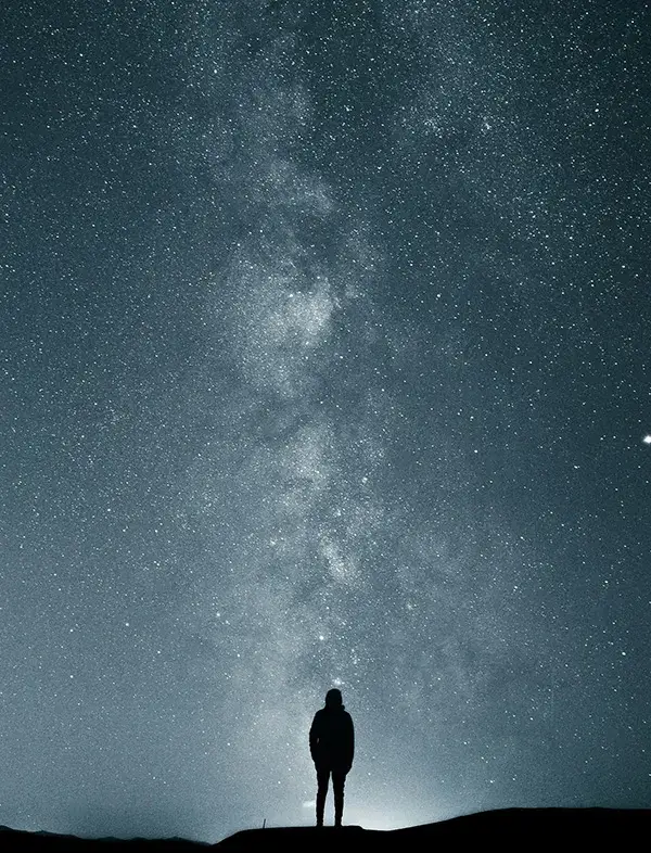 A person looking at the stars