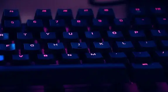 Keyboard with purple lighting